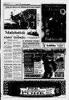 Huddersfield Daily Examiner Friday 10 December 1999 Page 11