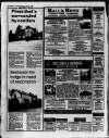 WEEKLY NEWS Thursday April 3 1986 PROPERTY FOCUS Pines that's surrounded by conifers SET well back from the road in